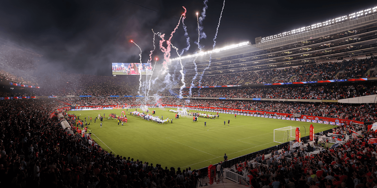 Crowd in stadium celebrating a sports event with fireworks and team presentations on the field