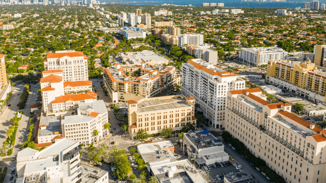 Aerial view of a vibrant urban area with residential and commercial buildings